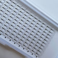 Premium lash extension tray with neatly arranged black individual lash fans from Leo Lash Range.