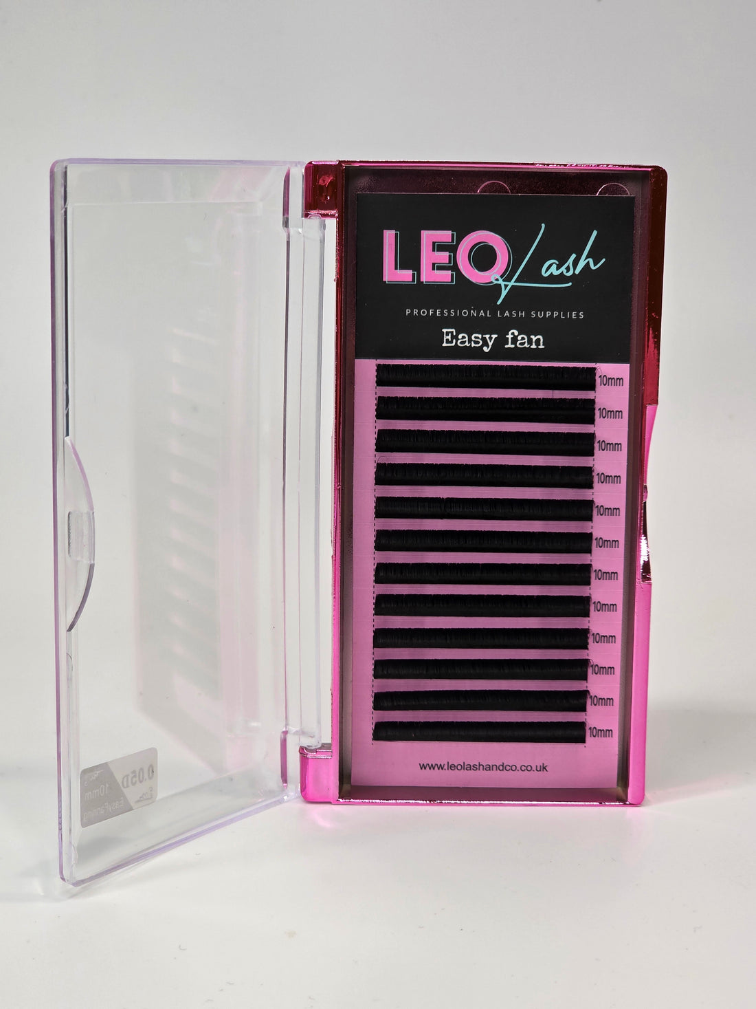 Pink case with false eyelashes and 'LEO' branding on a white background