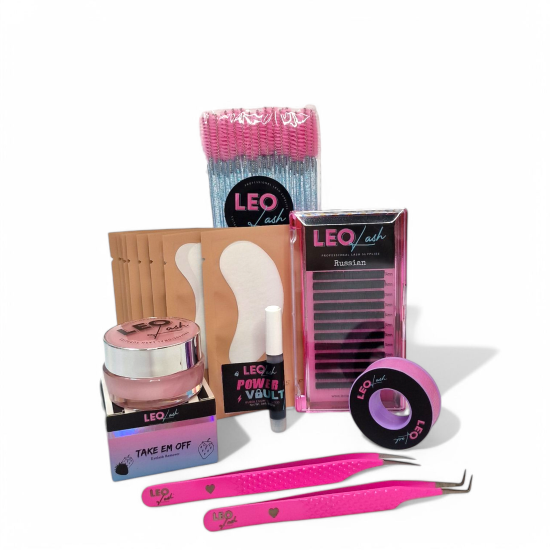 A collection of cosmetic tools and products including eyelash curlers, tweezers, glue rings, under eye pads, and a lash tape.