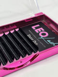 Pink case with black false eyelashes labeled 'LEO Lash' on a white background