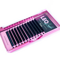 Leo Lash Range flat lash extensions in a pink tray, premium cruelty-free lash supplies