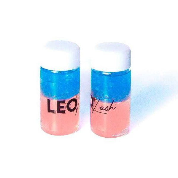 Leo Lash Range tweezer cleaner bottles with blue and pink liquid, lash accessory